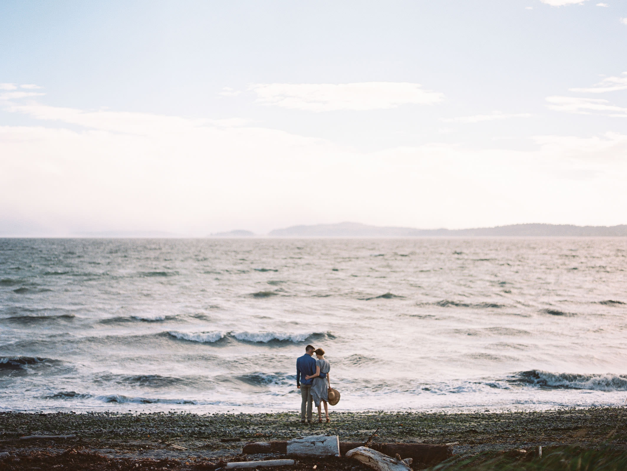 Romance on the water at Discovery Park by Seattle Engagement Photographer Anna Peters