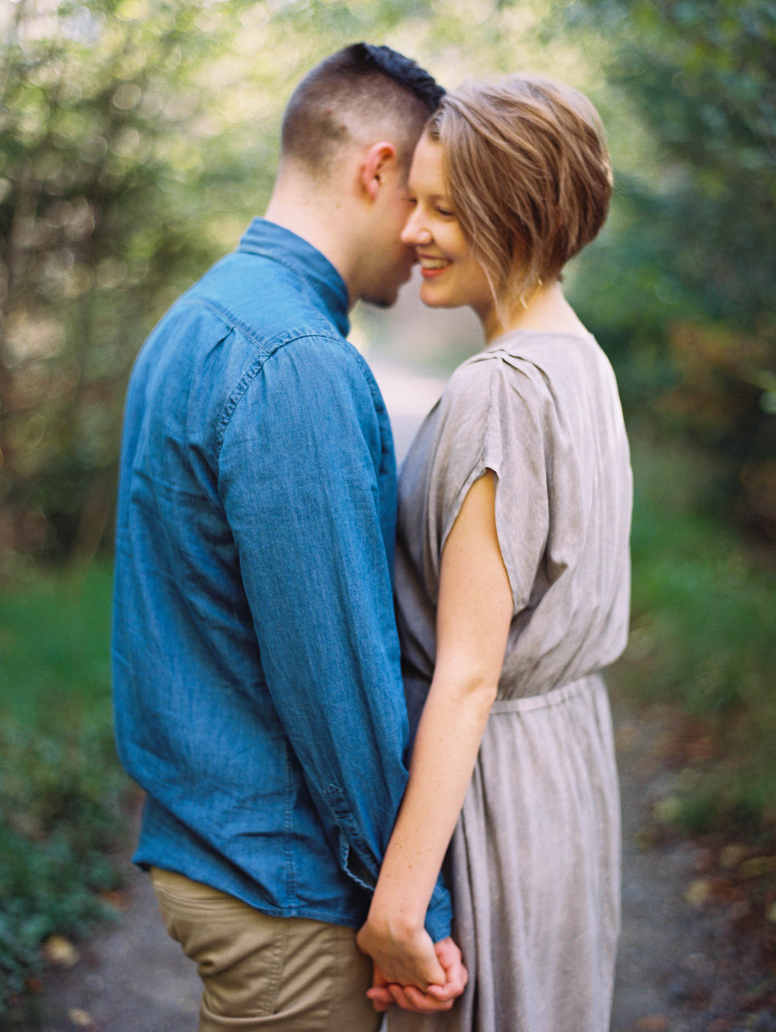 Joyful engagement session at discovery park by top Seattle Engagement Photographer Anna Peters